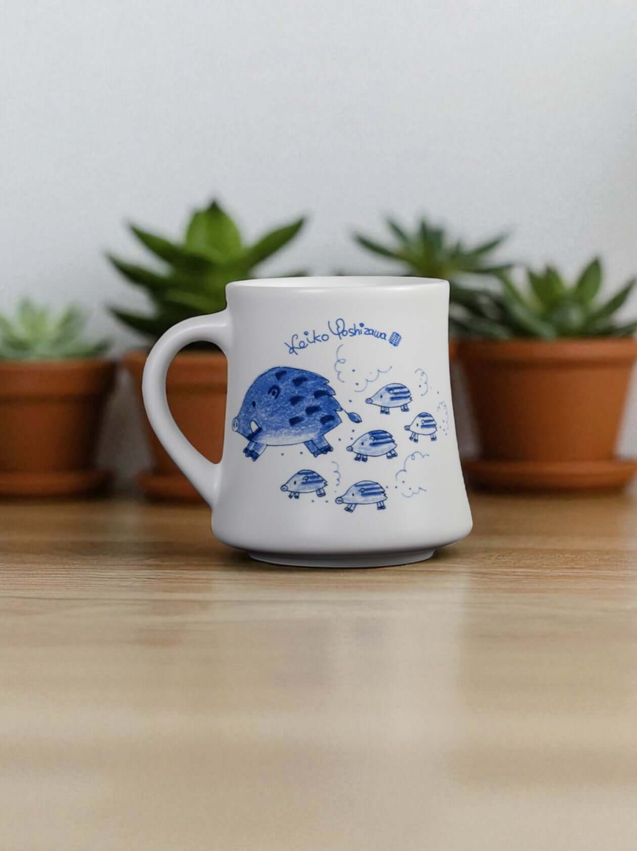 Mavolux handcrafted porcelain mug and plate set featuring a sketched boar illustration. Modern white ceramic cup and saucer with Tokyo-style art, made in Yingge Taiwan.