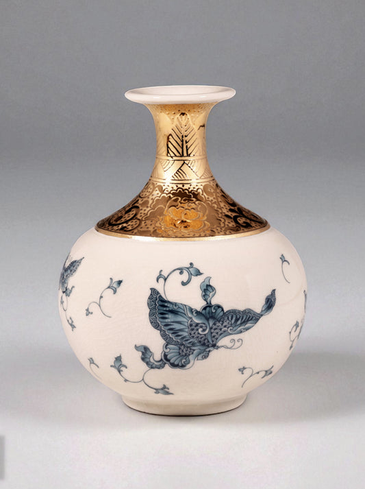Mavolux handcrafted porcelain vase in ivory-crackle glaze featuring delicate butterfly motifs and German 24K gold accents. Luxury 6-inch ceramic centerpiece made in Yingge Taiwan, symbolizing joy and transformation.